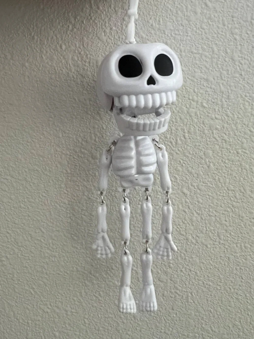 White Hanging Skeleton Decor - Festive Skull Accent